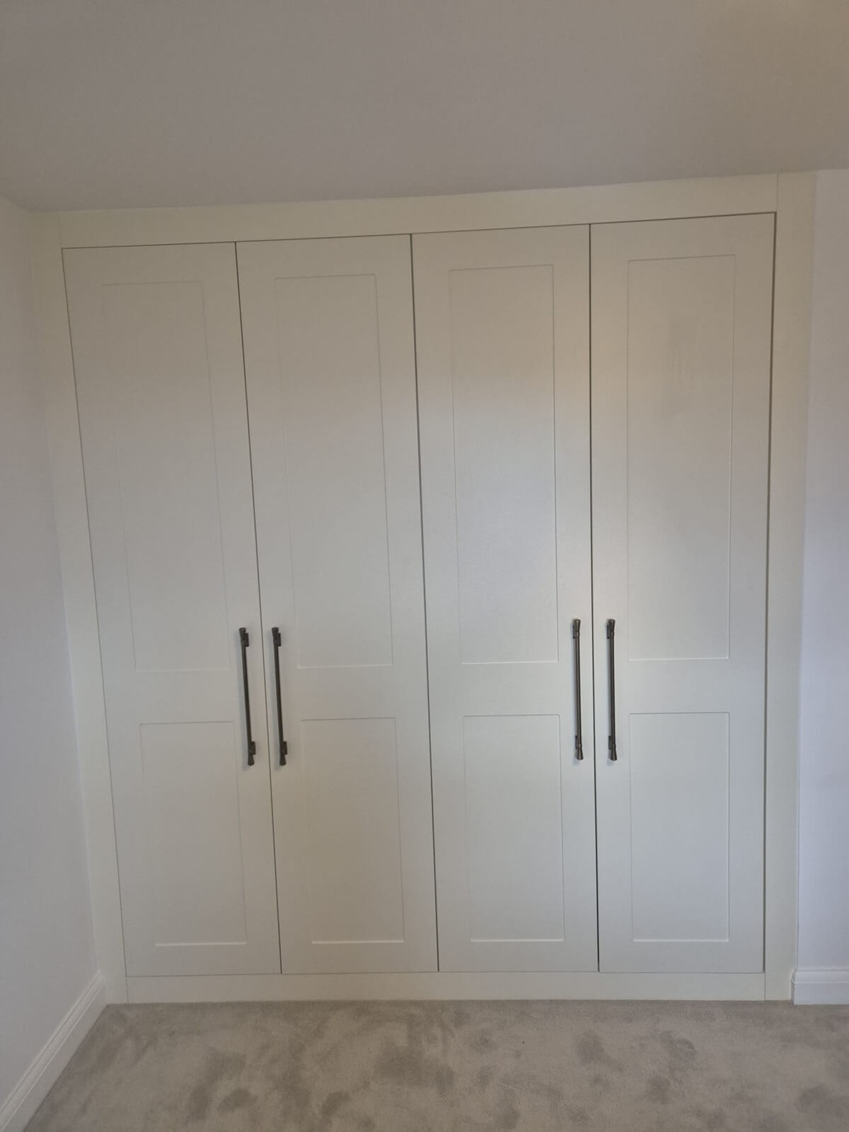 Hinged wardrobes,  Derby, white four panel bar handles