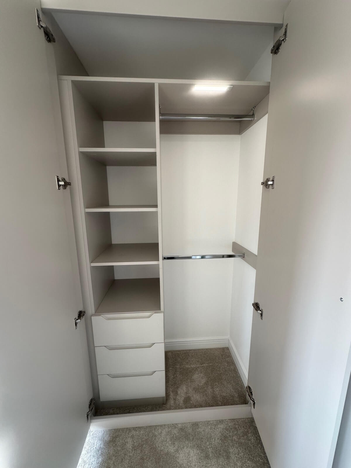 Hinged wardrobes in Lichfield dust grey interior with hanging shelves