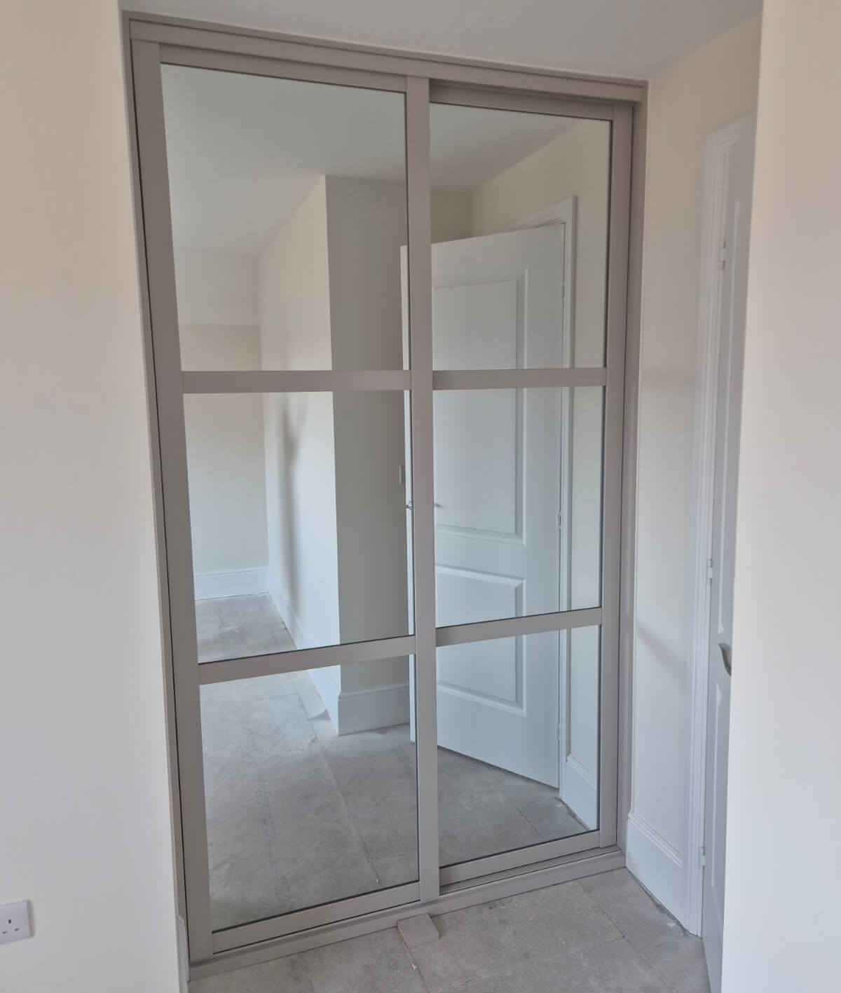 Cashmere shaker sliding wardrobe with three-equal-split silver mirror doors, by Vesta Space in Sutton Coldfield